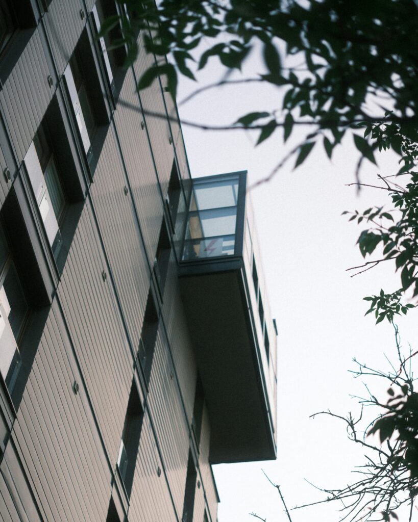 A tall building with a clock on the side of it