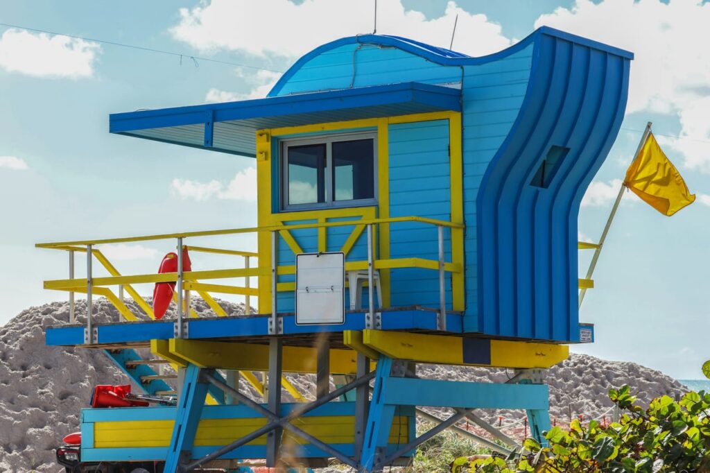 Blue and white wooden house under blue sky during daytime