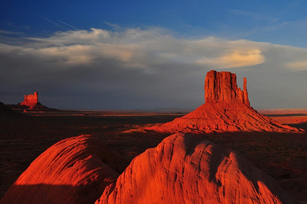 Brown rock formation under cloudy sky during daytime