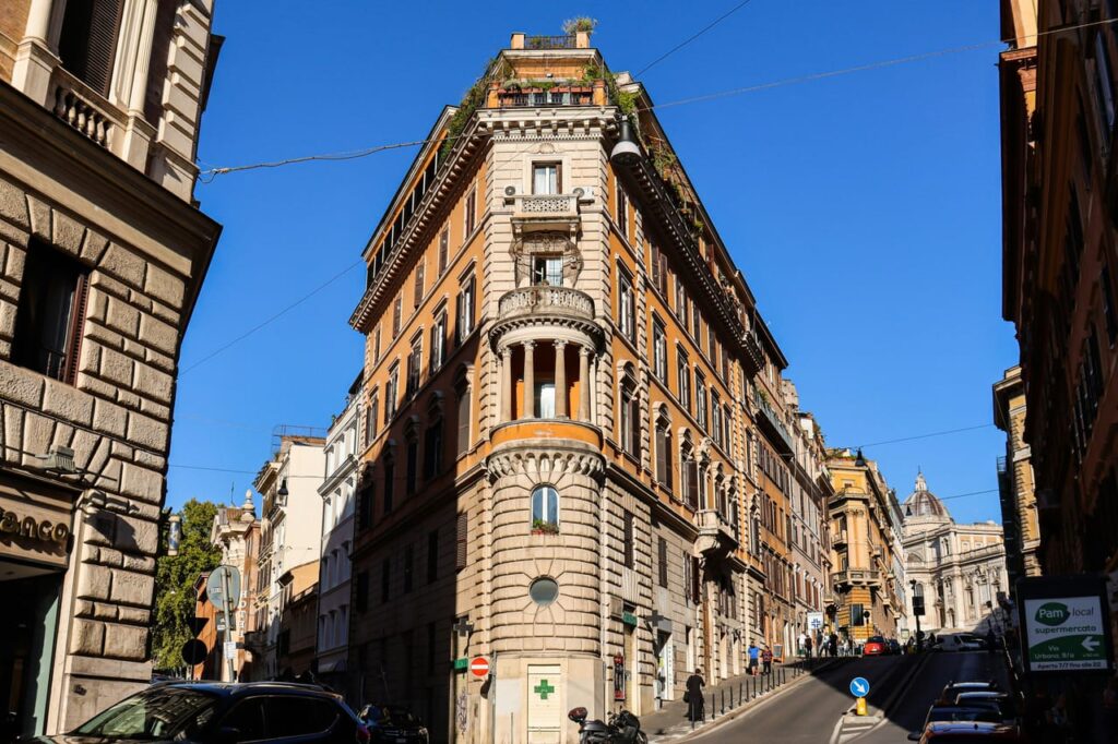 A very tall building sitting on the side of a street